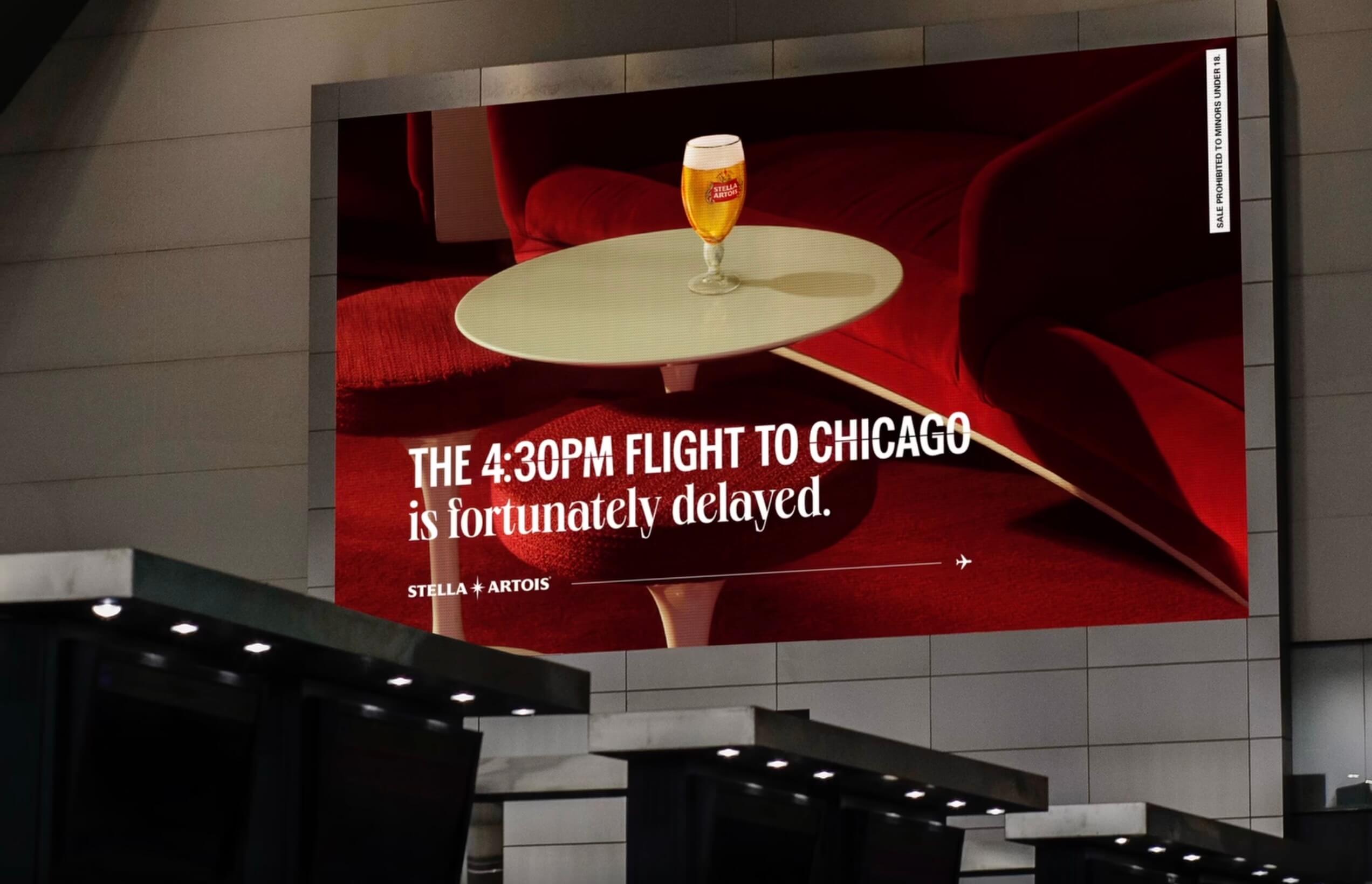 Digital airport billboard with text 'The 4:30 PM flight to Chicago is fortunately delayed' 